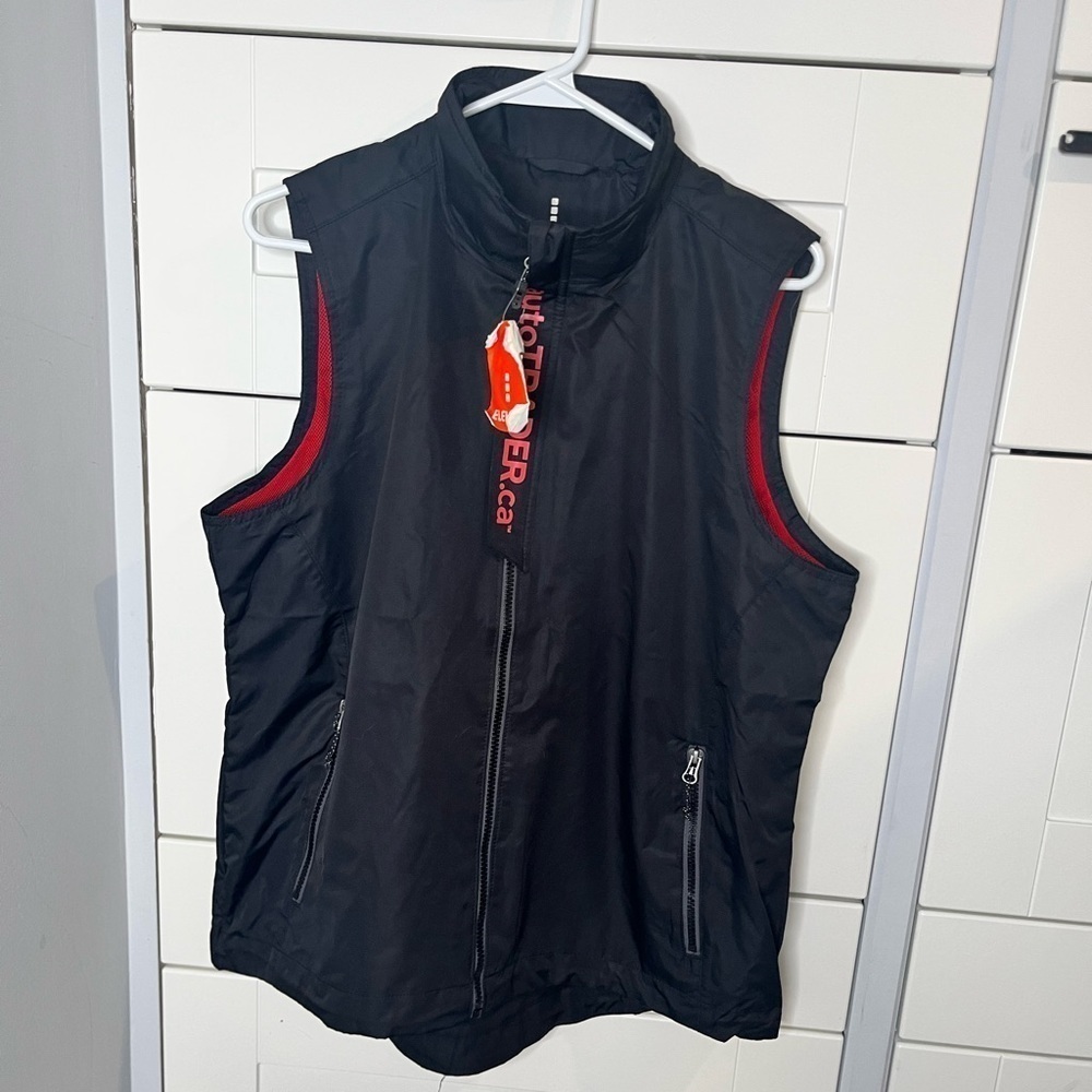 Elevate. Women’s vest. Auto trader. New but washed. Large. Black. Breathable.